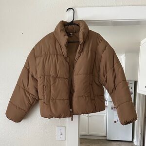 NWOT! Divided pocketed Puffer coat. Size XL. Tan color